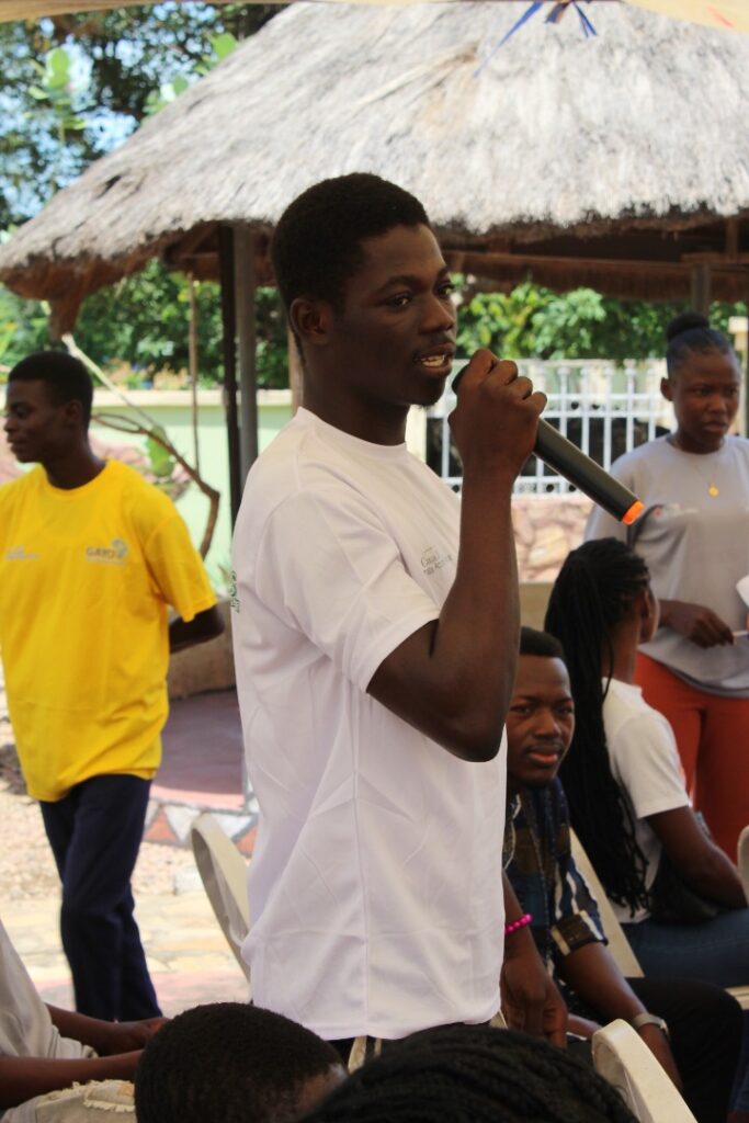 Linus, a proud climate youth educator in Bongo District
